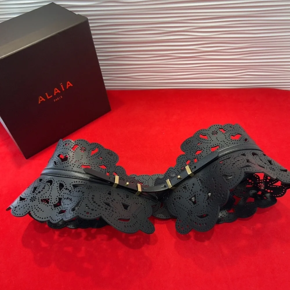 Alaïa Black Laser-Cut Floral Waist Belt with Gold Accents